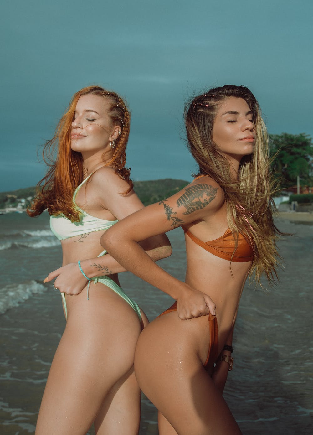 two women in their bikinis